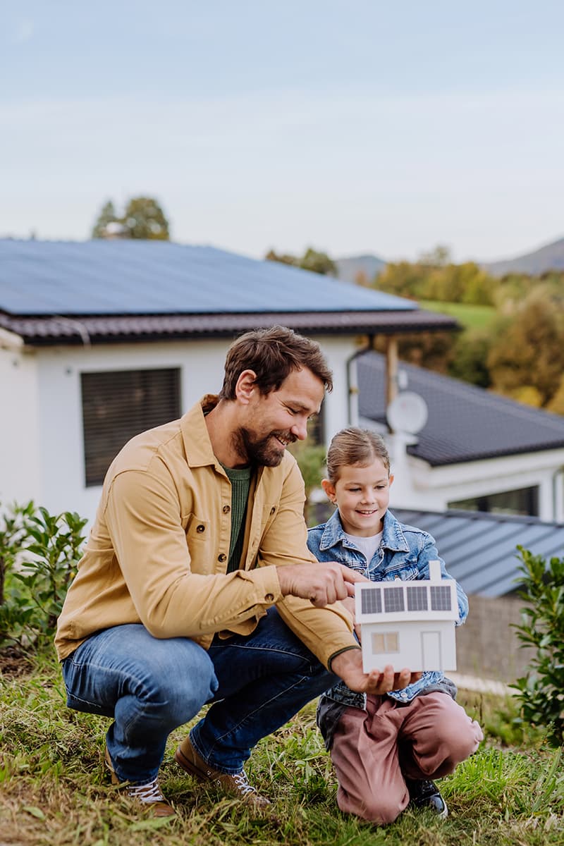 father explaining solar to son